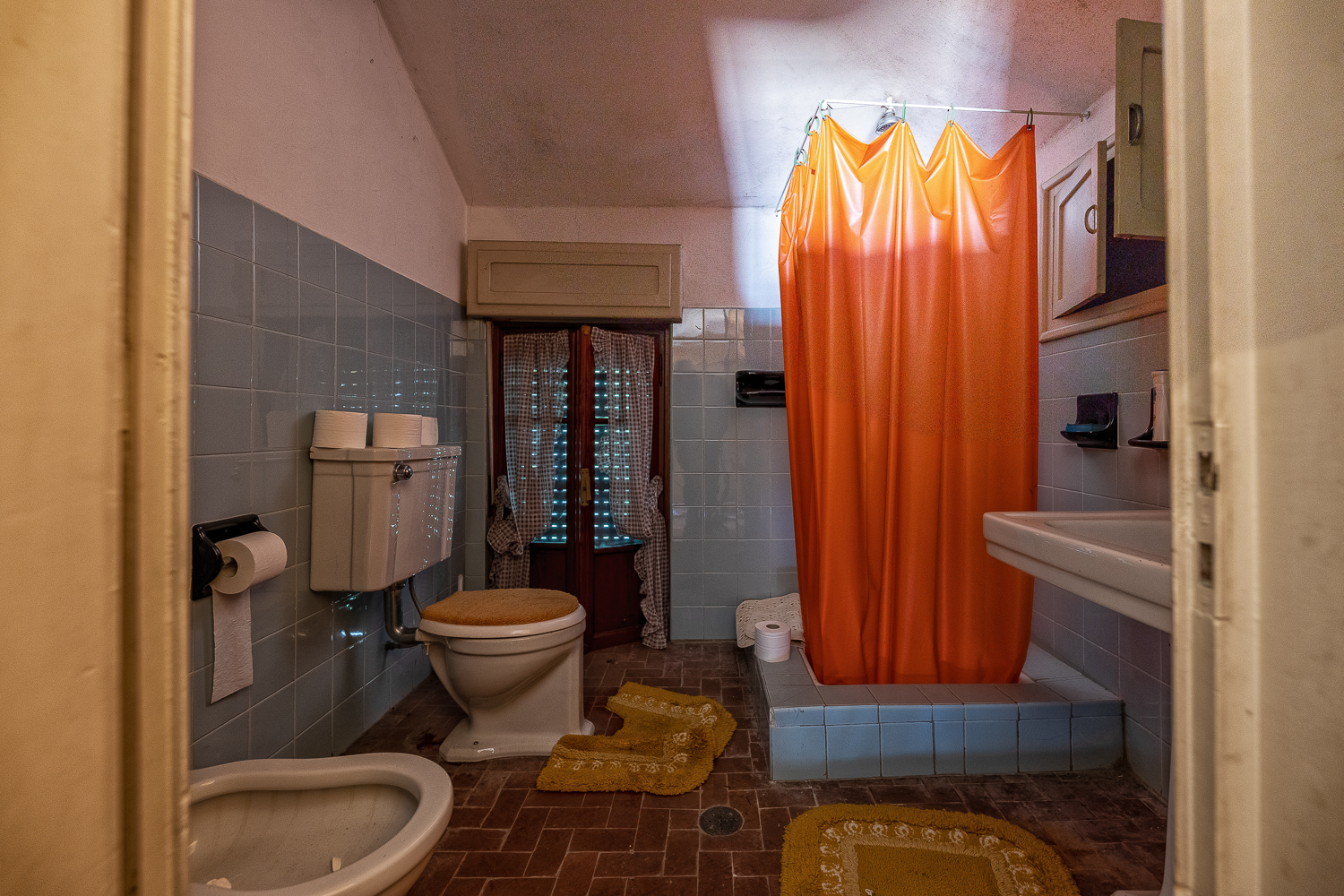 The Red Staircase of an Abandoned Villa in Italy