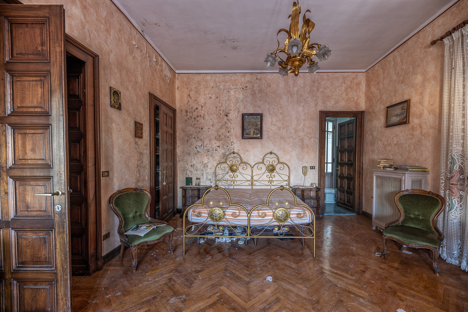 The Red Staircase of an Abandoned Villa in Italy