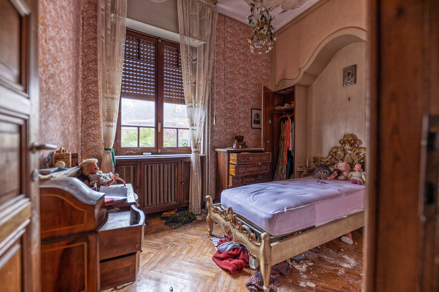 The Red Staircase of an Abandoned Villa in Italy