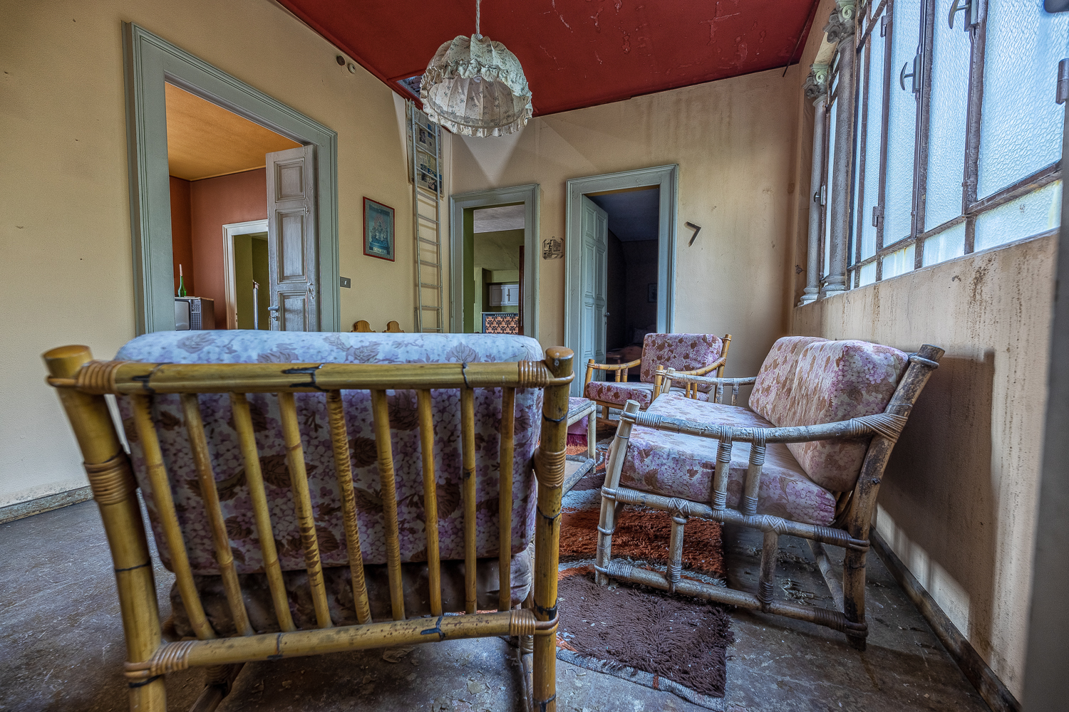 The Red Staircase of an Abandoned Villa in Italy