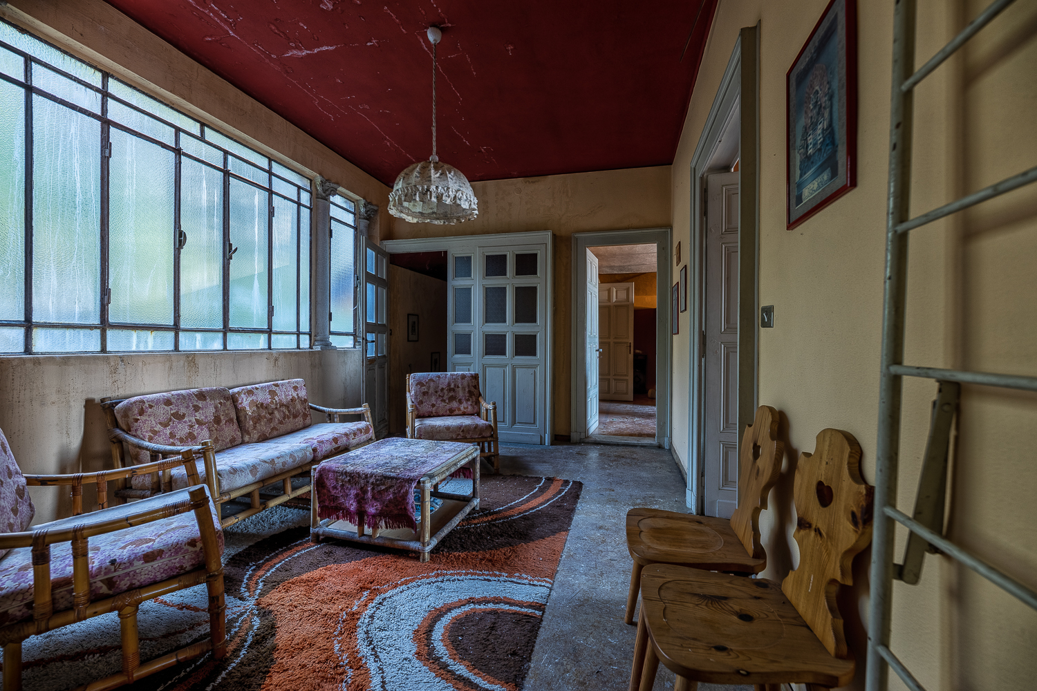 The Red Staircase of an Abandoned Villa in Italy